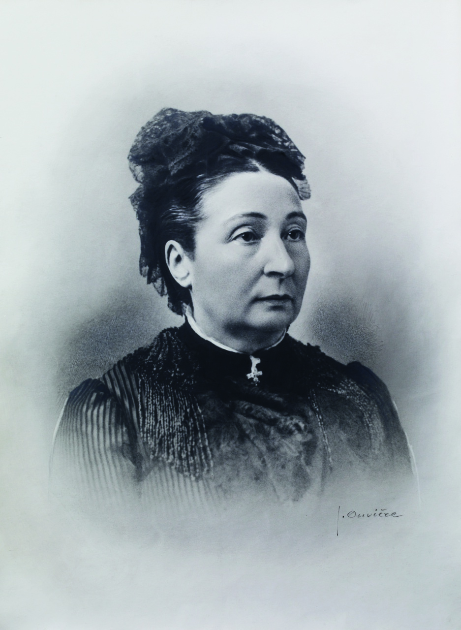 Portrait of Anne-Rosine Noilly, an elegant 19th-century woman, with determined gaze, characteristic of her role as a pioneer and businesswoman in the vermouth industry.